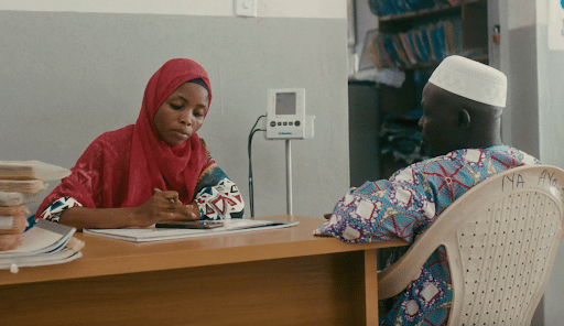 A health care worker using the DHIS2 app for hypertension management in Ogun State, Nigeria.